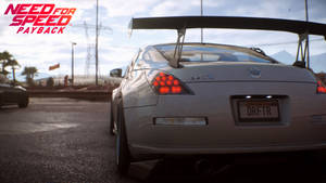 《Need for Speed Payback》遊戲中，日落時分沙漠賽道上的銀色日產350Z賽車。 — 日產 壁紙