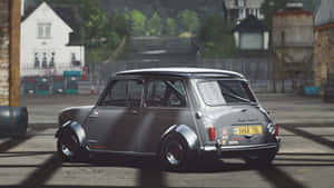 銀色經典Mini Cooper S賽車在工業庭院中，背景有石頭建築。 — 電玩遊戲 GIF 壁紙
