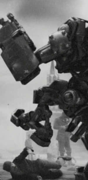 一個巨型機器人站在戰區中倒下的士兵之上。 — 遊戲 壁紙