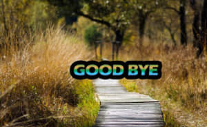 穿過金色草地的木質小徑，帶有彩虹色 'GOOD BYE' 文字。 — 再見 壁紙