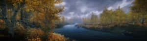 一條霧氣瀰漫的秋河流經金色樺樹林，天空陰暗。 — 電玩遊戲 GIF 壁紙