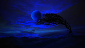 在深藍色的夜空下，一棵孤獨的樹伸向發光的月亮。 — 高畫質月亮 壁紙