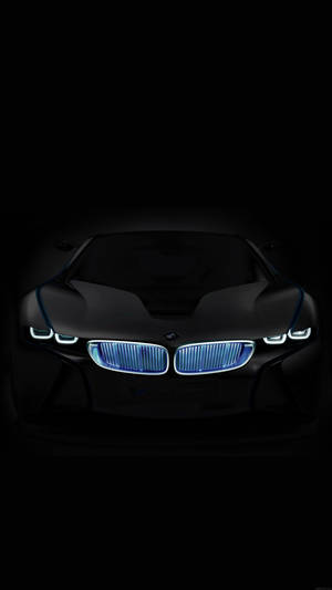 時尚的黑色BMW i8概念車，在黑暗中發出藍色光芒。 — 舊金山 iPhone 壁紙