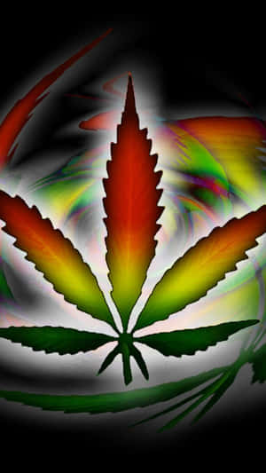 在黑暗旋轉背景中發光的彩虹大麻葉。 — 放鬆的藥癮者 壁紙