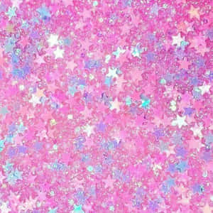 粉紅、紫色和藍色星形亮粉營造出閃爍夢幻的質感。 — 明亮 壁紙