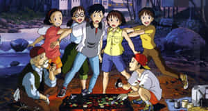 小孩和年長男子在黃昏時分在河邊燒烤食物。 — 善逸 GIF 壁紙