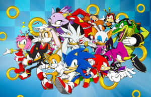 Sonic the Hedgehog和朋友們擺出動作姿勢，金色圓環在他們周圍漂浮。 — MacBook Air 壁紙