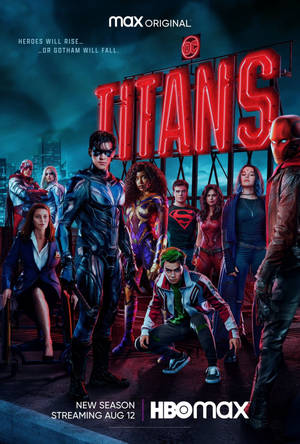 一個超級英雄團隊在黑暗城市景觀中發光的紅色 Titans 標誌下擺姿勢。 — 高譚 壁紙