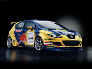 2005年SEAT Leon Cupra賽車，帶有Red Bull和Repsol品牌標誌，在工作室燈光下拍攝。 — 4:3 壁紙
