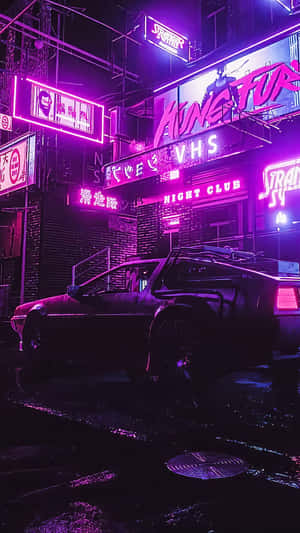 DeLorean在雨中未來主義街道的霓虹燈下。 — 電玩遊戲 GIF 壁紙