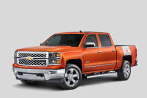 橙色 Chevrolet Silverado 皮卡車，車斗側板上帶有 Texas Longhorns 標誌。 — 雪佛蘭 壁紙