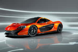 橙色McLaren P1超級跑車在反光地板上，背景動態模糊。 — 跑車 壁紙