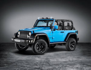 一輛藍色Jeep Wrangler，帶有黑色飾件和輪胎，在攝影棚中。 — 美麗的藍色 壁紙