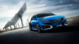 藍色Peugeot 308R在日落時分飛馳經過太陽能板。 — Mercedes Benz C300 壁紙