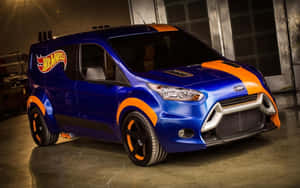 藍色和橙色Hot Wheels福特廂型車在車庫中，帶有定制輪圈和賽車條紋。 — Steam Deck OLED 壁紙