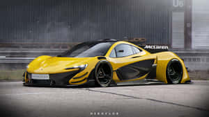 黃色McLaren超級跑車停在倉庫附近的賽道上。 — iMac 壁紙