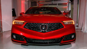 紅色Acura汽車在帶有紅色照明的車庫中亮起車頭燈。 — Acura 壁紙