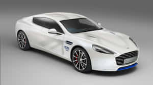 白色Aston Martin跑車，帶有藍色飾條和'GREAT'標誌，在攝影棚內。 — 奧斯頓馬丁 壁紙