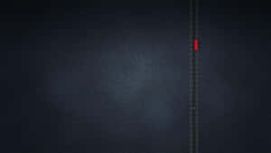 一輛紅色汽車沿著縫在深色牛仔布上的道路行駛。 — 丹寧 壁紙