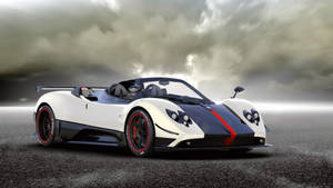 帶有紅色點綴的白色和黑色Pagani Zonda跑車，在暴風雨天空下的潮濕道路。 — 好看汽車 壁紙