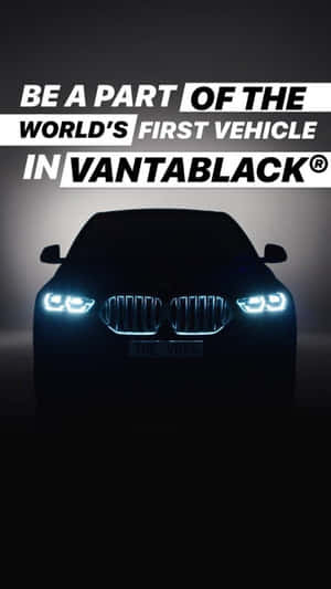 在黑暗的攝影棚環境中，採用Vantablack塗裝的BMW汽車，車頭燈發光。 — 最佳黑暗 壁紙