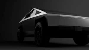 時尚黑色Tesla Cybertruck，棱角設計，在昏暗的攝影棚燈光下。 — 特斯拉 壁紙