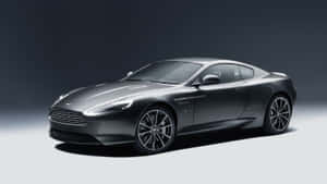 攝影棚燈光下的時尚啞光灰色 Aston Martin 跑車。 — 奧斯頓馬丁 壁紙