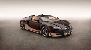 棕色和銅色Bugatti Veyron Grand Sport敞篷車，配備棕褐色皮革內飾，在混凝土地板上。 — Bugatti iPhone 壁紙