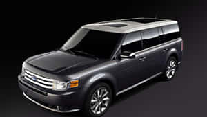 深灰色福特Flex SUV，帶有鍍鉻飾邊和有色車窗，在工作室燈光下。 — 福特 壁紙