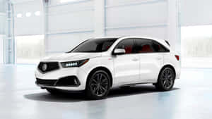 白色Acura SUV，黑色輪圈和紅色座椅，在積雪的車庫中。 — 豪華車 壁紙