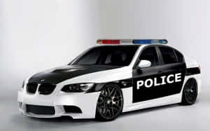工作室環境中帶有燈條的白色和黑色BMW警車。 — 警察 GIF 壁紙