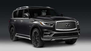 磨砂黑色豪華SUV，在工作室燈光下帶有鍍鉻細節。 — 好看汽車 壁紙