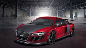 大型工業倉庫中的紅黑色ABT Audi R8跑車。 — 奧迪 GIF 壁紙