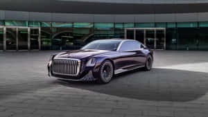 紫色豪華轎車停在現代玻璃建築前。 — 好看汽車 壁紙