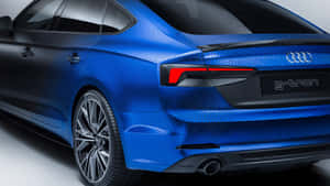 藍色Audi g-tron轎車，帶有六邊形塗裝圖案和紅色尾燈。 — 奧迪 GIF 壁紙