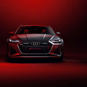 銀色Audi Sport汽車在紅色工作室燈光下的前視圖。 — iPad Pro 12.9 壁紙