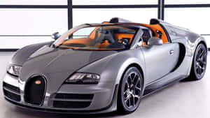 在明亮的環境中，銀色Bugatti Veyron Grand Sport配橙色內裝。 — Bugatti iPhone 壁紙