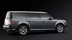 銀色Ford Flex SUV在攝影棚拍攝，背景黑暗，帶有鍍鉻裝飾。 — 福特 壁紙