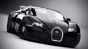 黑色Bugatti Veyron配金色飾邊在攝影棚燈光下 — Bugatti iPhone 壁紙