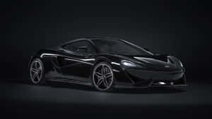 黑色McLaren跑車在工作室中，帶有戲劇性燈光。 — 麥拉倫 壁紙