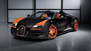 在簡約工作室環境中的黑色和橙色Bugatti Veyron跑車。 — 布加迪 GIF 壁紙