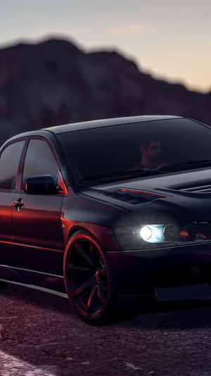 黑色跑車停泊在黃昏的碎石路上，背後有山脈。 — 電玩遊戲 GIF 壁紙