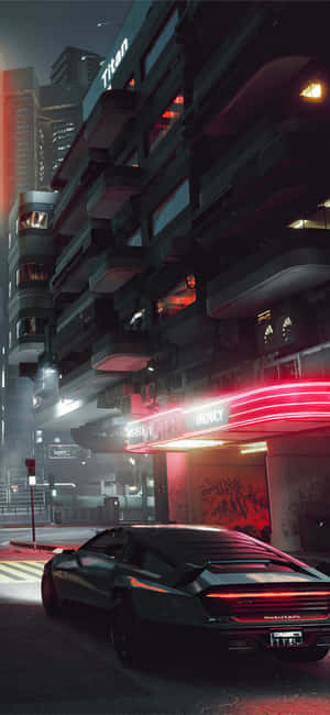 黑色跑車停在發光的霓虹招牌下，在雨中的未來城市夜晚。 — 電玩遊戲 GIF 壁紙