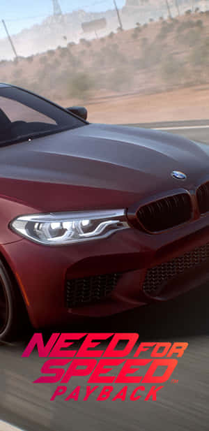 紅色BMW M5在沙漠公路上賽車，帶有Need for Speed Payback標誌。 — Galaxy S10 壁紙
