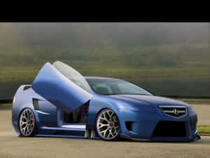 藍色訂製跑車，鷗翼車門敞開，停在霧氣瀰漫的路邊。 — Acura 壁紙