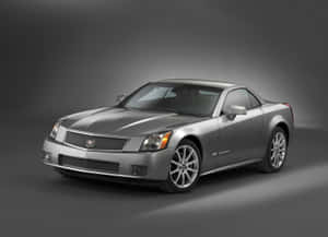 銀色Cadillac XLR敞篷跑車在攝影棚燈光下。 — 凱迪拉克 壁紙