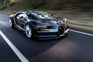 日落時分黑色Bugatti Chiron在道路上疾馳 — 布加迪 GIF 壁紙