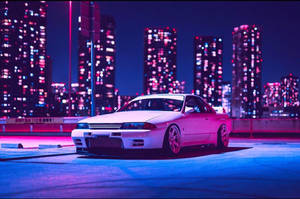 夜晚城市屋頂上在霓虹燈下停放的白色跑車。 — 霓虹燈 壁紙