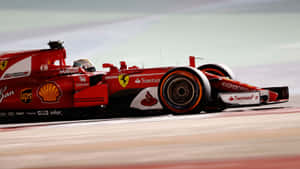 紅色法拉利F1賽車在白天於賽道上疾馳。 — F1 2019 壁紙