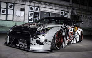 自訂黑白色JDM日產GT-R，紅色輪圈，在混凝土車庫中。 — 日產GTR 壁紙